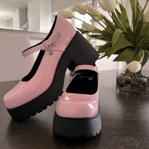 Baby pink platform heels